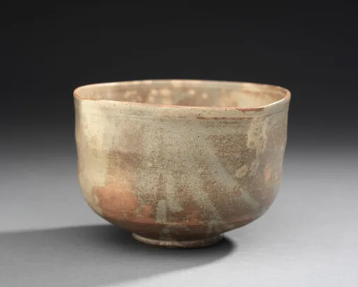 Rounded square tea bowl with flowing glaze A Japanese tea bowl.