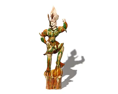 A statue of a man dressed in a costume, holding a sword, stands prominently in a public space. A statue of a man dressed in a costume, holding a sword, stands prominently in a public space.