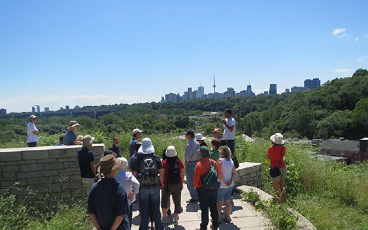 Don Valley lookout from which you can see the whole north slope of sediments (and the downtown skyline).
 Group stands with Toronto skyline in Background
