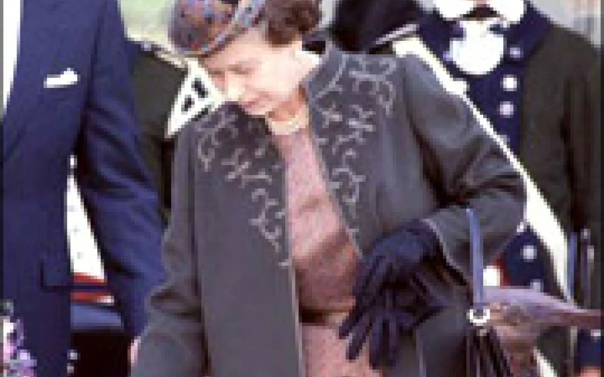 Her Majesty the Queen Elizabeth signing the visitor book, 1984.More Information