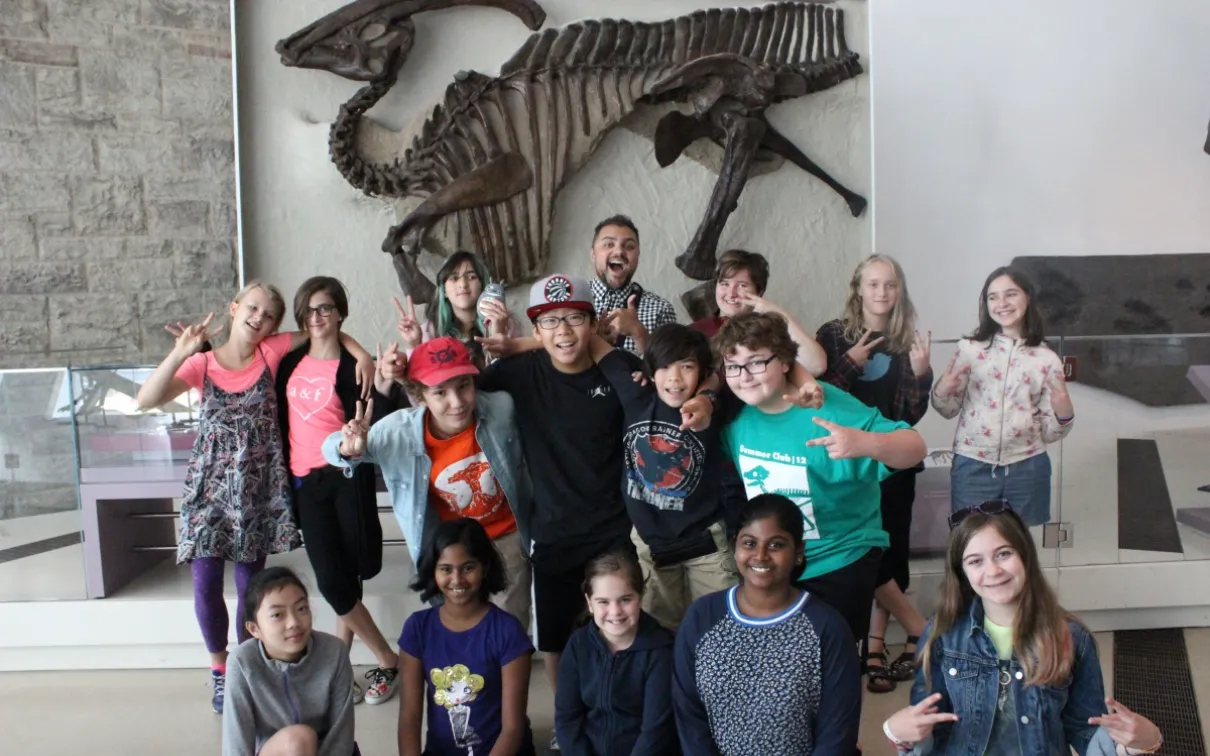 A group of happy campers in front of the Museum's famous Parasaurolophus. A group of happy campers in front of the Museum's famous Parasaurolophus.