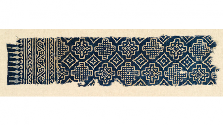 Textile fragment. Made in Gujarāt, India; used in Egypt. 1200-1499. Printed and resist dyed cotton tabby. 978.76.304 Abemayor Collection given in memory of Dr. Veronika Gervers, Associate Curator, Textile Department (1968-1979) by Albert and Federico Friedberg. Certified by the Canadian Cultural Property Export Review Board under the terms of the Cultural Property Export and Import Act.