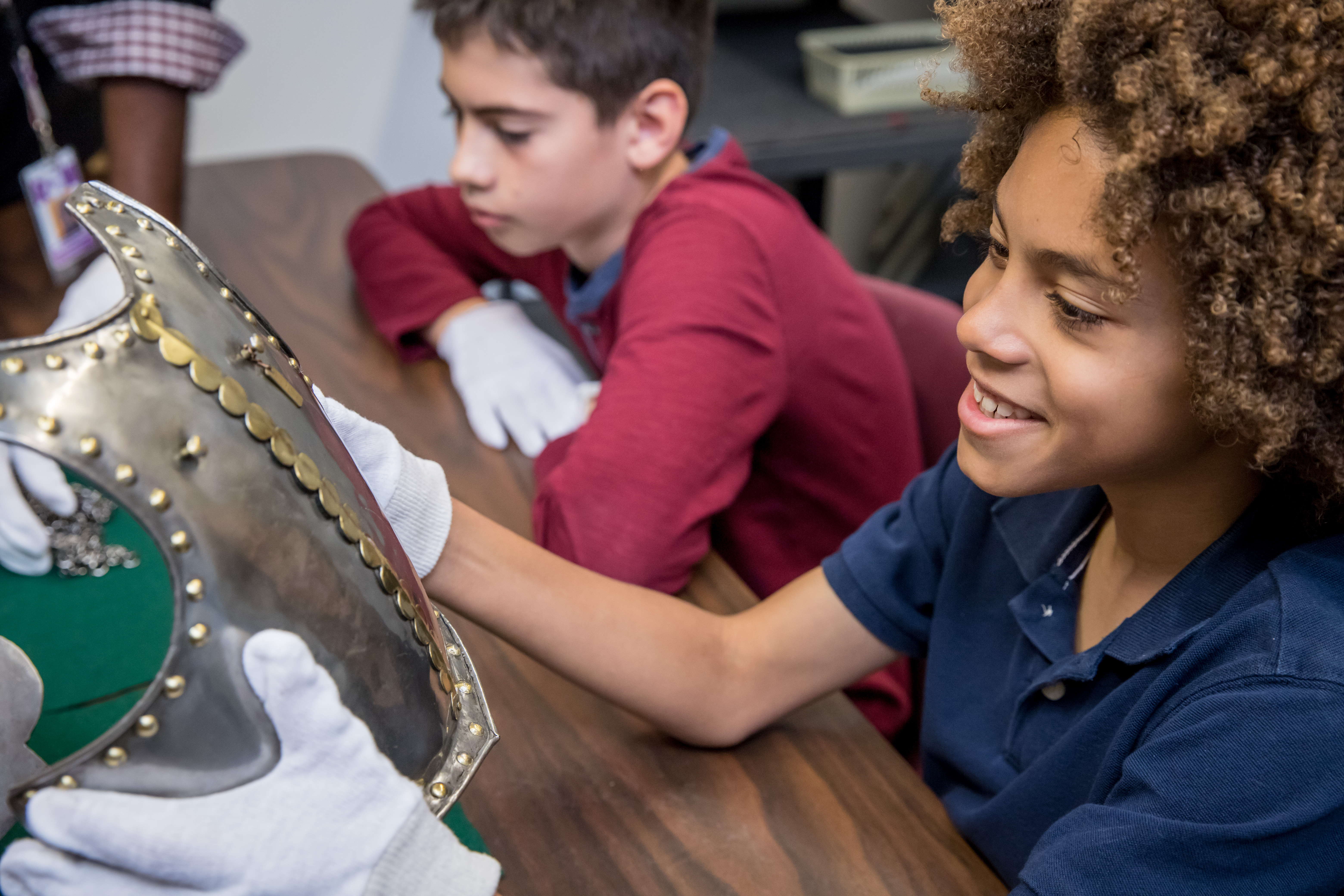 Student looking at armour