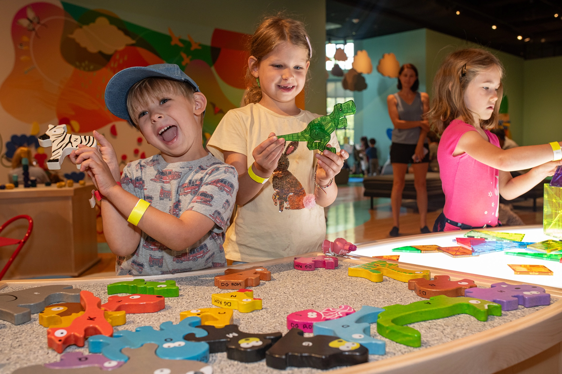 3 Children enjoying activities at ROM