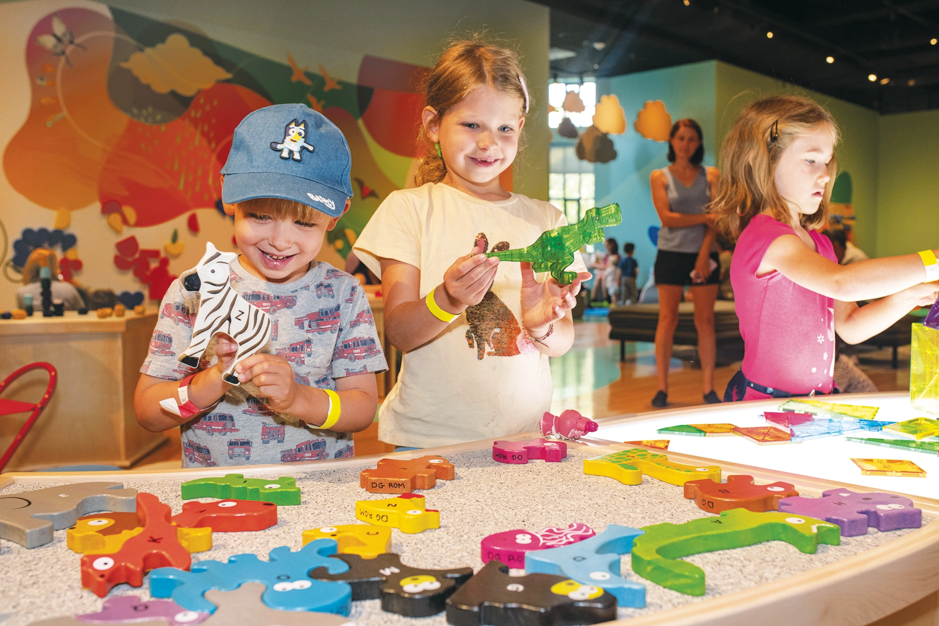 3 children enjoying an activity at ROM Kids PA Day Camp