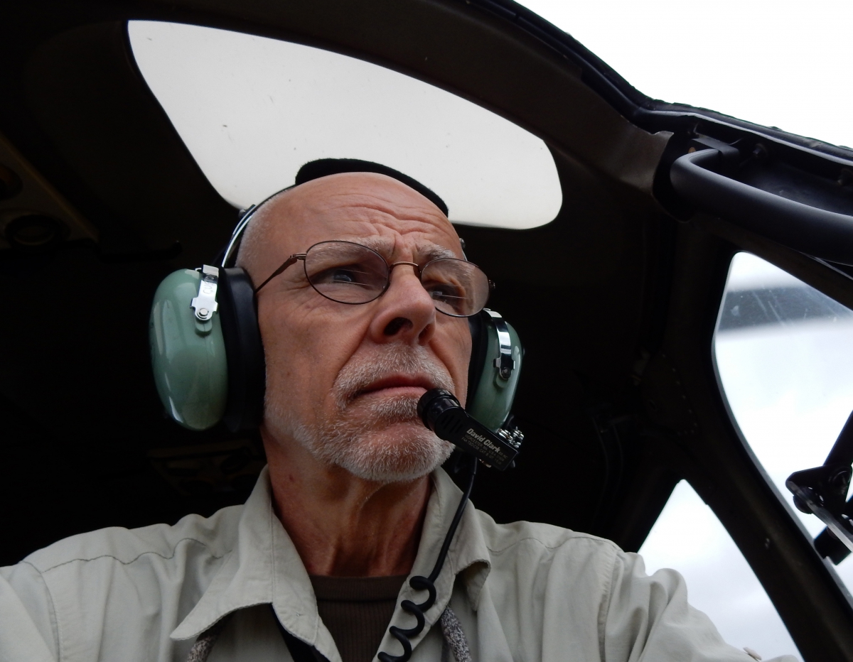 David Rudkin flying in a helicopter over Churchill. - david_rudkin_-_churchill_2015_022_ps_2