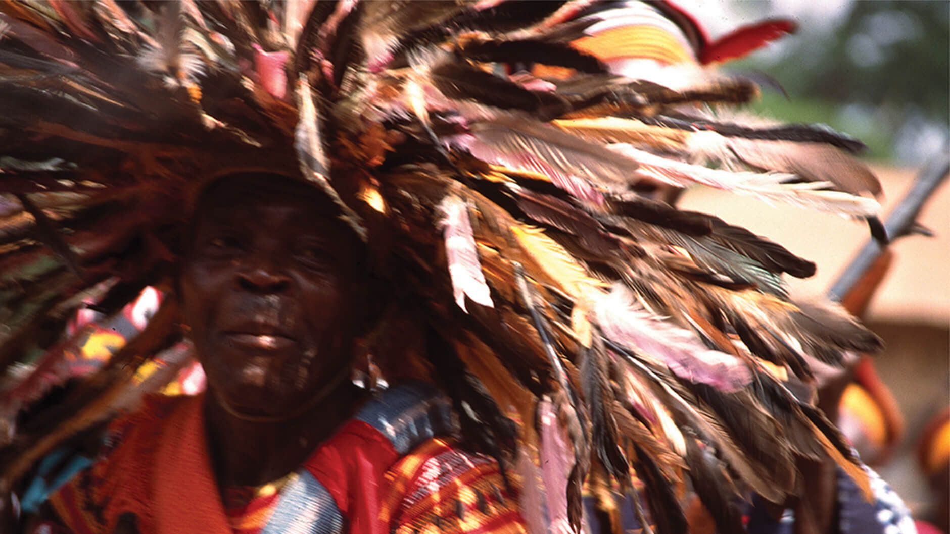 Person with feather headdress.