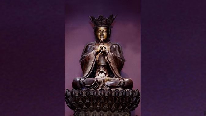 The bronze Vairocana Buddha sits majestically in the Samuel Hall Currelly Gallery, at almost 8 feet high and 5 feet wide, welcomes visitors.