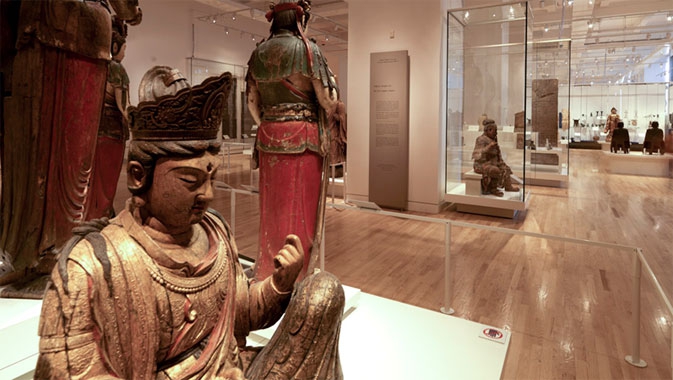 Bishop White Gallery of Chinese Temple Art, showing wooden Buddhist sculptures in the ROM gallery