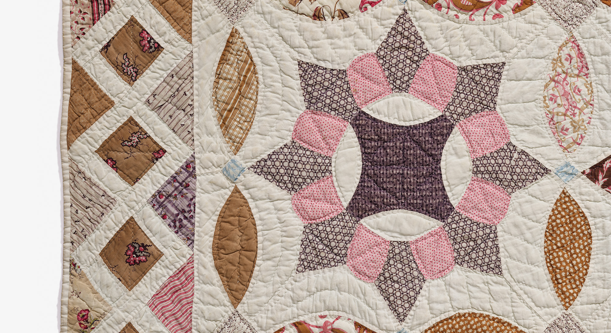 Patchwork quilt (detail), 1840-1850, Belleville, Ontario. Cut and pieced roller-printed cotton tabby. 969.188.2. Gift of Mrs. C. D. McPherson. Image @ ROM.