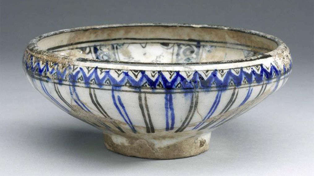 Bowl with geometric interlace pattern.