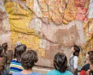 Tour guide leading a tour at ROM