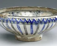 Bowl with geometric interlace pattern.
