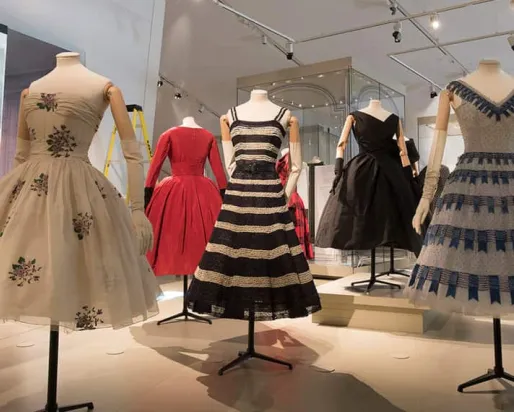 Five Dior dresses on display at the ROM.
