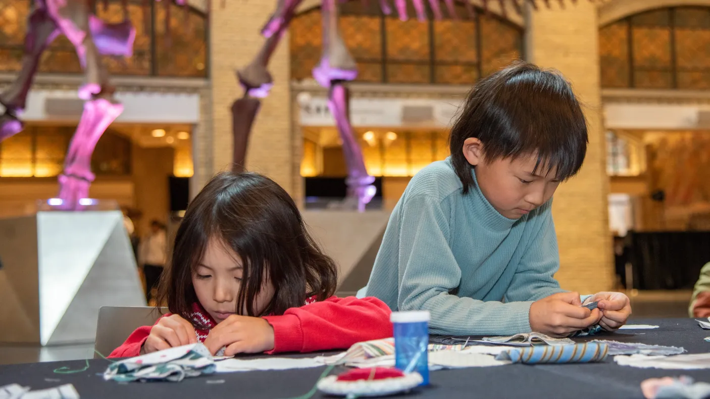 Children doing an activity at ROM during March Break