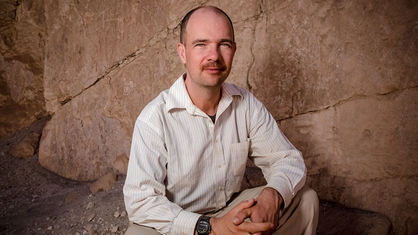 Portrait of Justin Jennings in the Field
