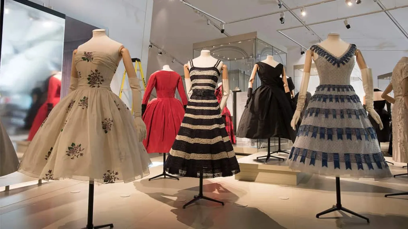 Five Dior dresses on display at the ROM.
