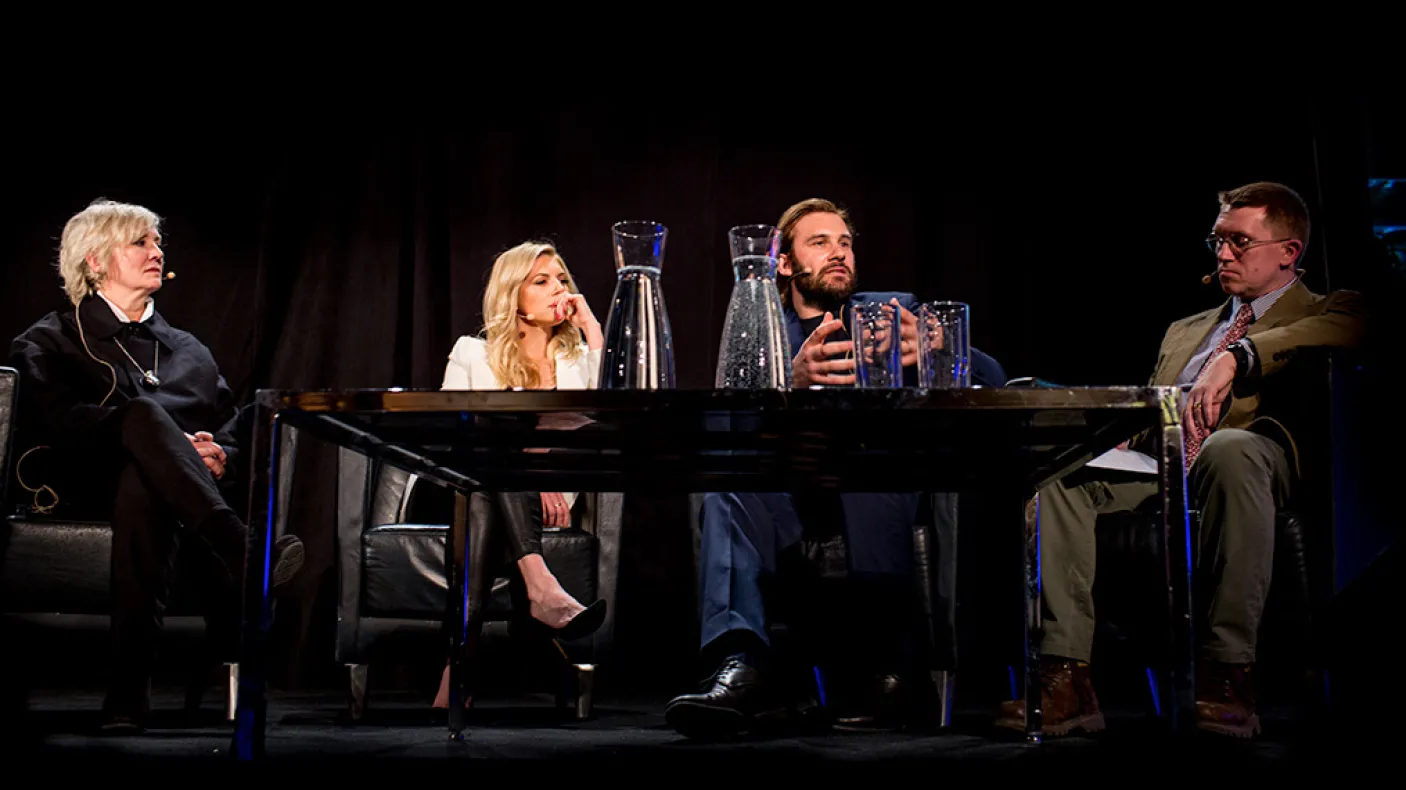 Neil Price with Sheila Hockin, Clive Standen, and Katheryn Winnick on stage.
