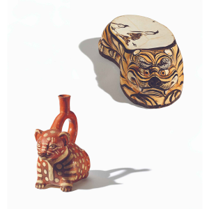 -	Pillow in tiger form, ca. 1150–1234 CE, moulded, slipped stoneware with iron-brown paint and glaze. Stirrup spout vessel in the form of a seated cat. Made and used by the Moche in Peru, 200–600 CE. ROM 926.21.101. Bishop William C. White Collection. Stirrup spout vessel, ROM 924.34.12. Photos by Paul Eekhoff.