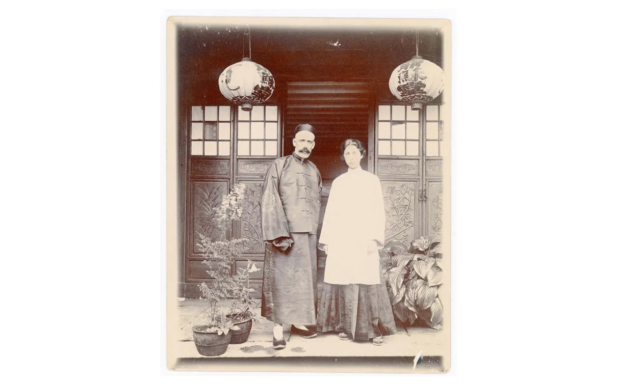 Dr. Clark and his wife Wynnie, in front of “Yesu tang” (Jesus Hall).