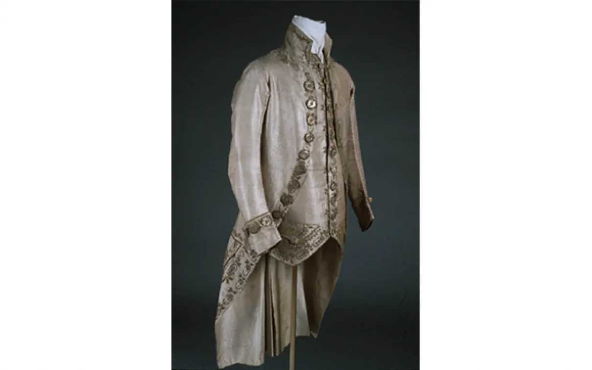 Man's 3-piece suit. England. 1770-1779. Silk droguet with silver filé weft and brown flushing-warp pattern, embroidered in coiled metal wire (gold bullion), gold and silver sequins, silver foil and glass paste. 909.33.4.A-C. Man's 3-piece suit. England. 1770-1779. Silk droguet with silver filé weft and brown flushing-warp pattern, embroidered in coiled metal wire (gold bullion), gold and silver sequins, silver foil and glass paste. 909.33.4.A-C.