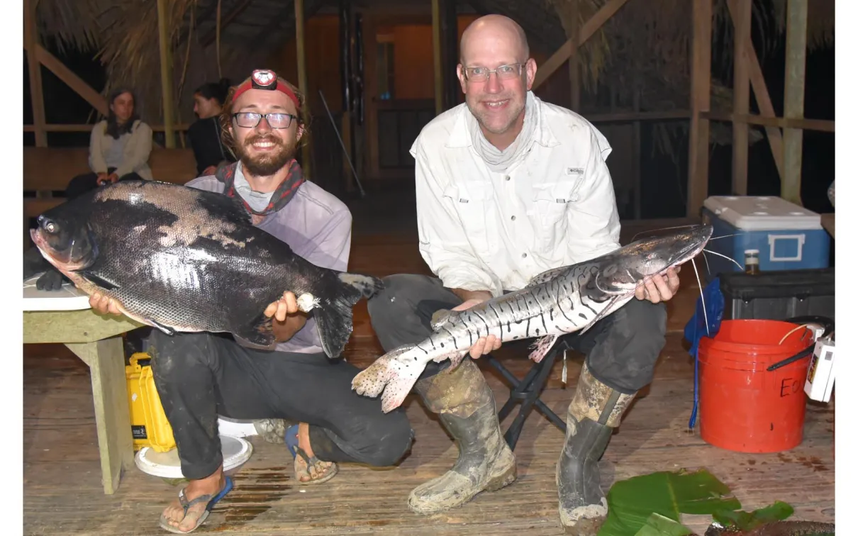 Boily and Lujan show off the day’s catches in the Sabalo Cofán Community.