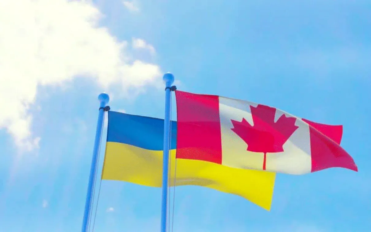 Ukrainian & Canadian flags.
