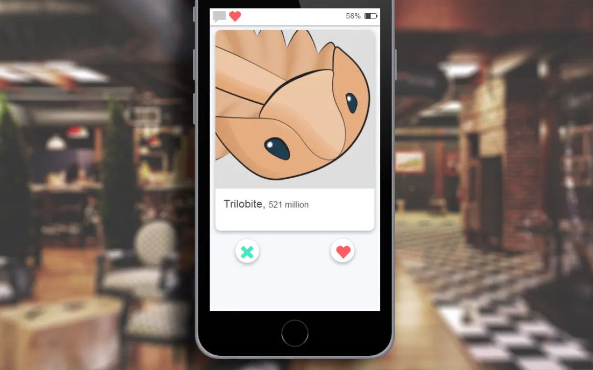 a phone displays a dating app with a picture of a trilobite
