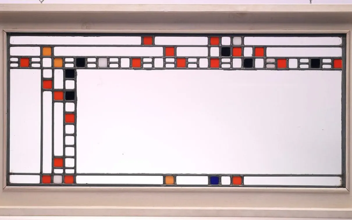 Stained glass panel by Frank Lloyd Wright Designed in 1912 for the Avery Coonley Playhouse,  Clear and coloured glass, lead latticing, wood 2000.22.3   Gift of the Louise Hawley Stone Charitable Trust; Purchased by the ROM with the assistance of a Moveable Cultural Property grant accorded by the Minister of Canadian Heritage under the terms of the Cultural Property Export and Import Act.