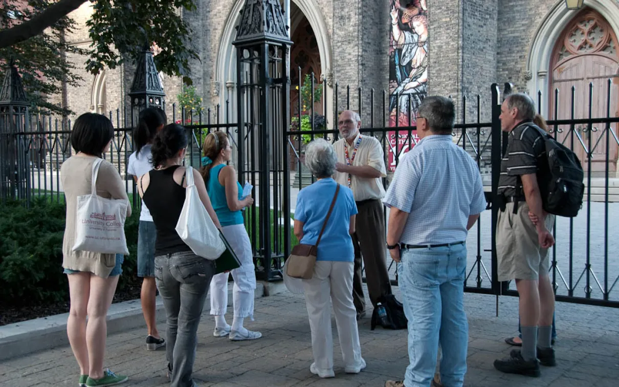 A volunteer leads a ROM Walk