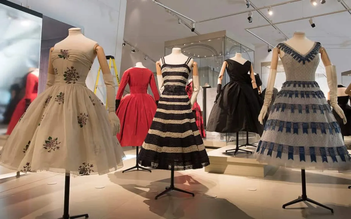 Five Dior dresses on display at the ROM.
