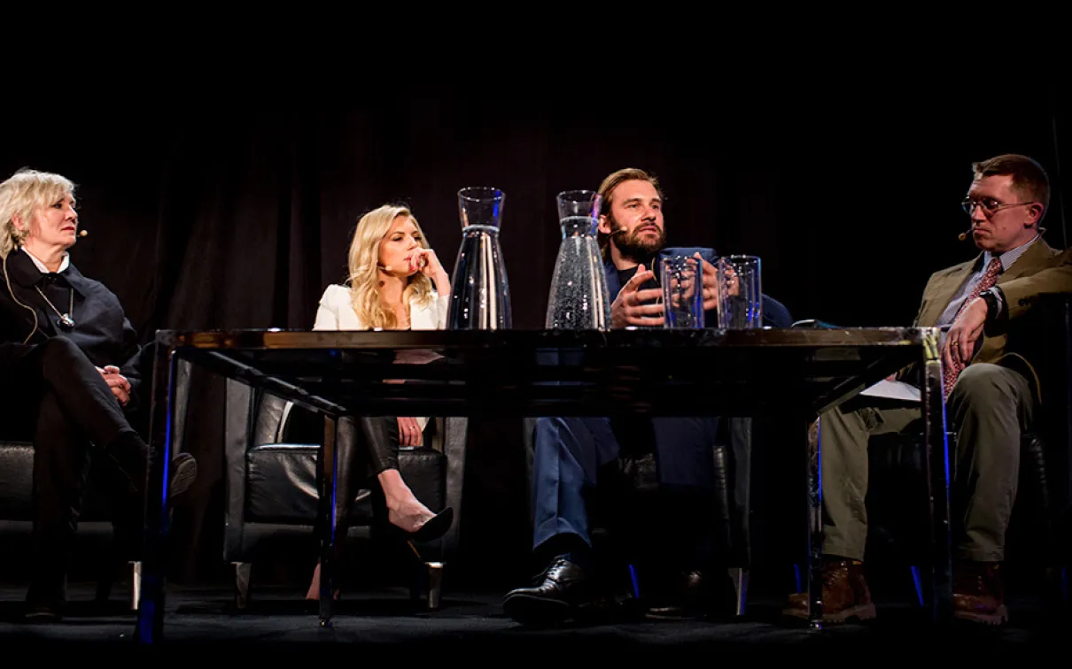 Neil Price with Sheila Hockin, Clive Standen, and Katheryn Winnick on stage.
