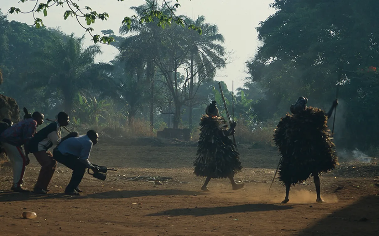 People dancing in a field.