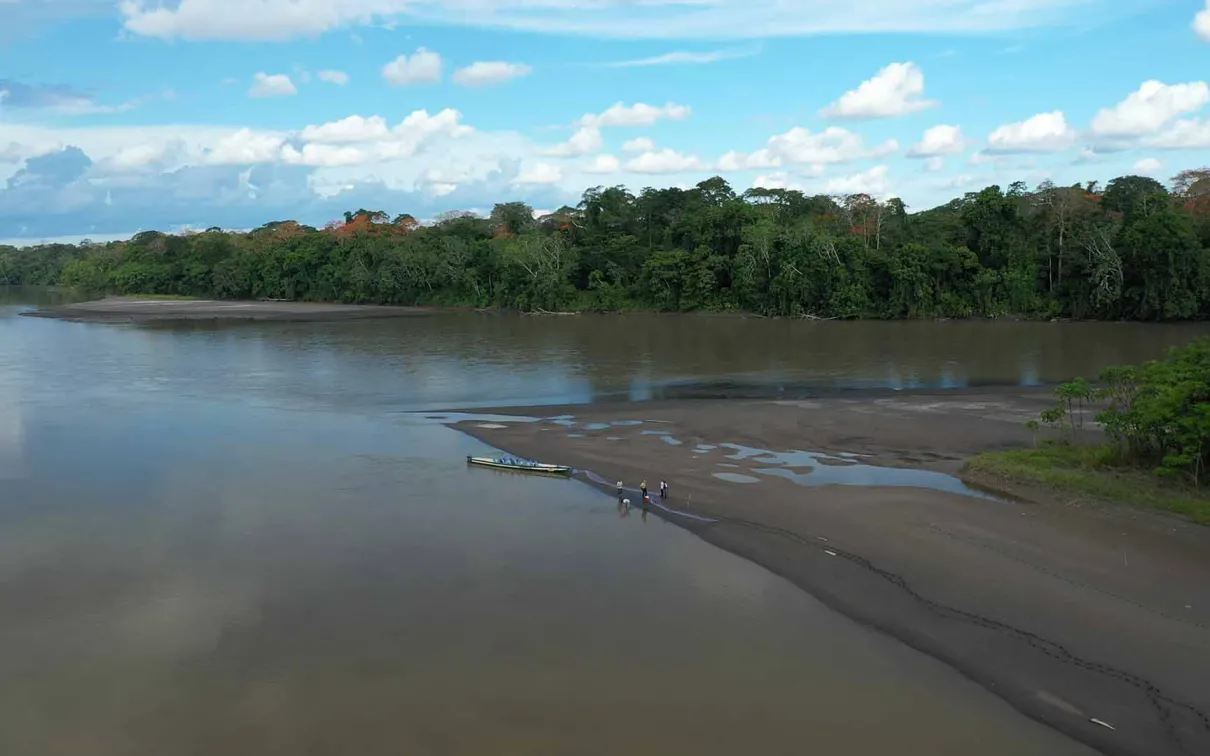 An overhead drone captures the WWF-Ecuador-funded research team in the field.