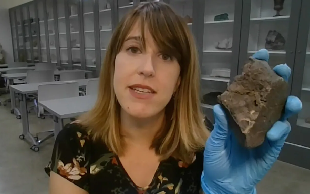 Veronica DiCecco holding asteroid.
