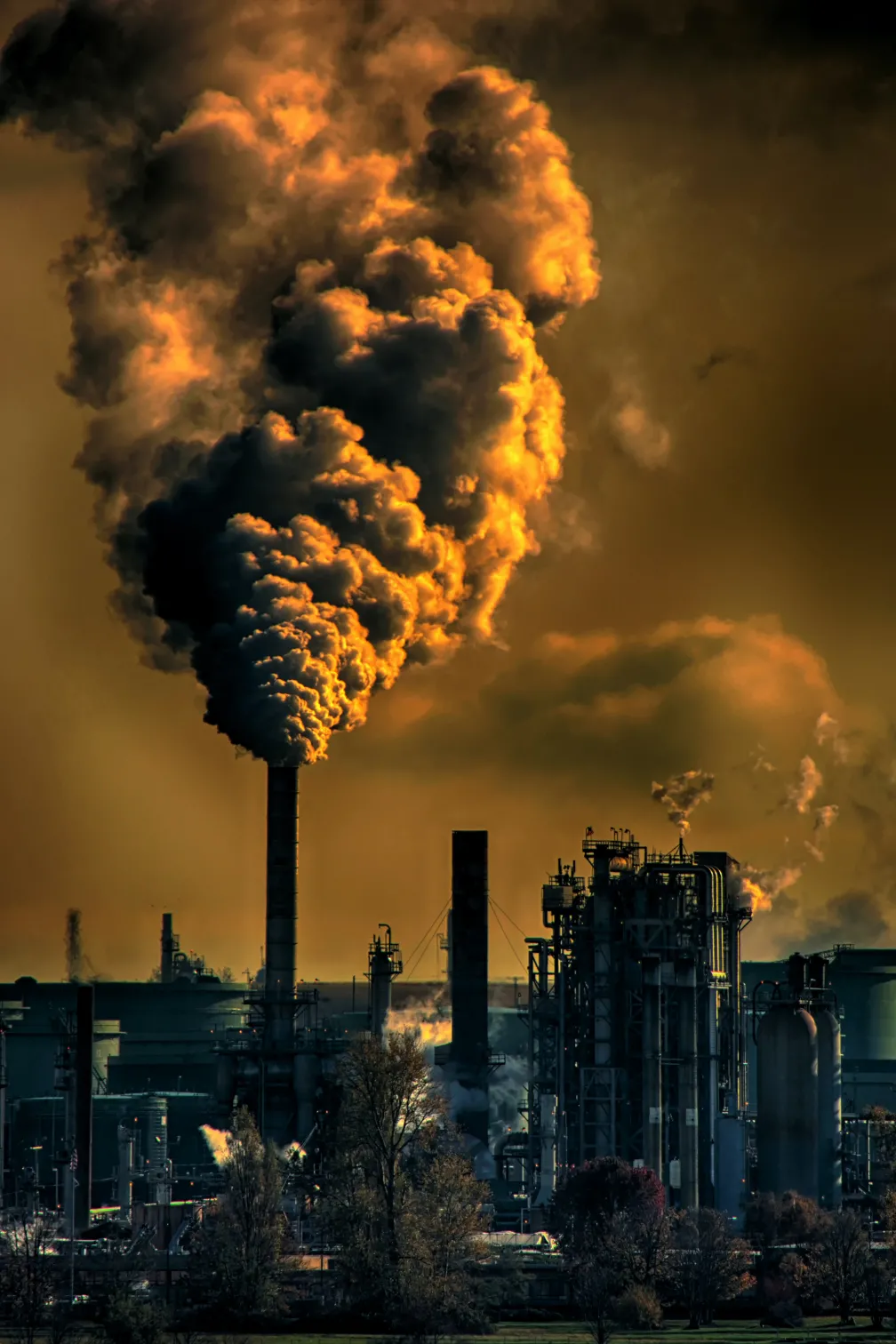 Smoke cloud coming out of a factory's chimney.