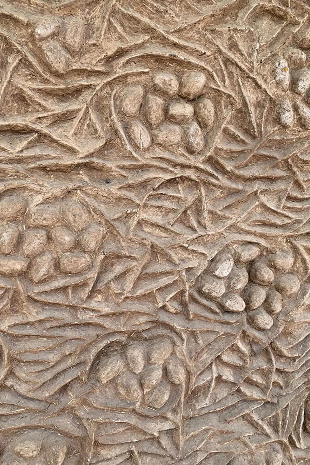 Mulberry pattern on the wall of the main Zoma Museum building.