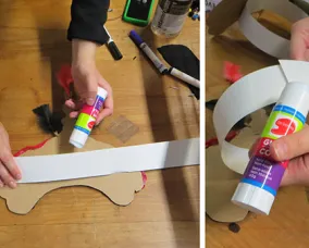 a long strip of cardboard is glued into a circle