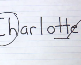 Drawing of the name Charlotte with the ch circled, double letters underlined, and e crossed out.